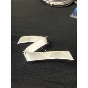 Vintage Monet Silver Tone Ribbon Brooch Modernist Curved Pin